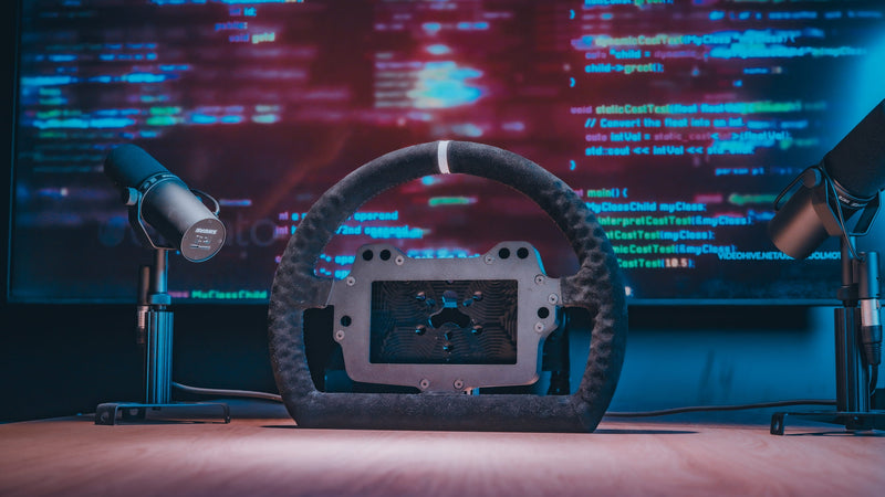 Collino racing steering wheel featuring HexaGrip structural technology in a professional simulator setup.